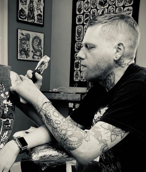Image of Doug Landry, artist at tattoo shop Cosmic Sea Tattoo in Portland, Maine